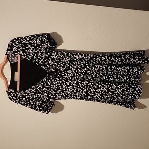 Michael Kors Babydoll dress size Medium, black with white petals